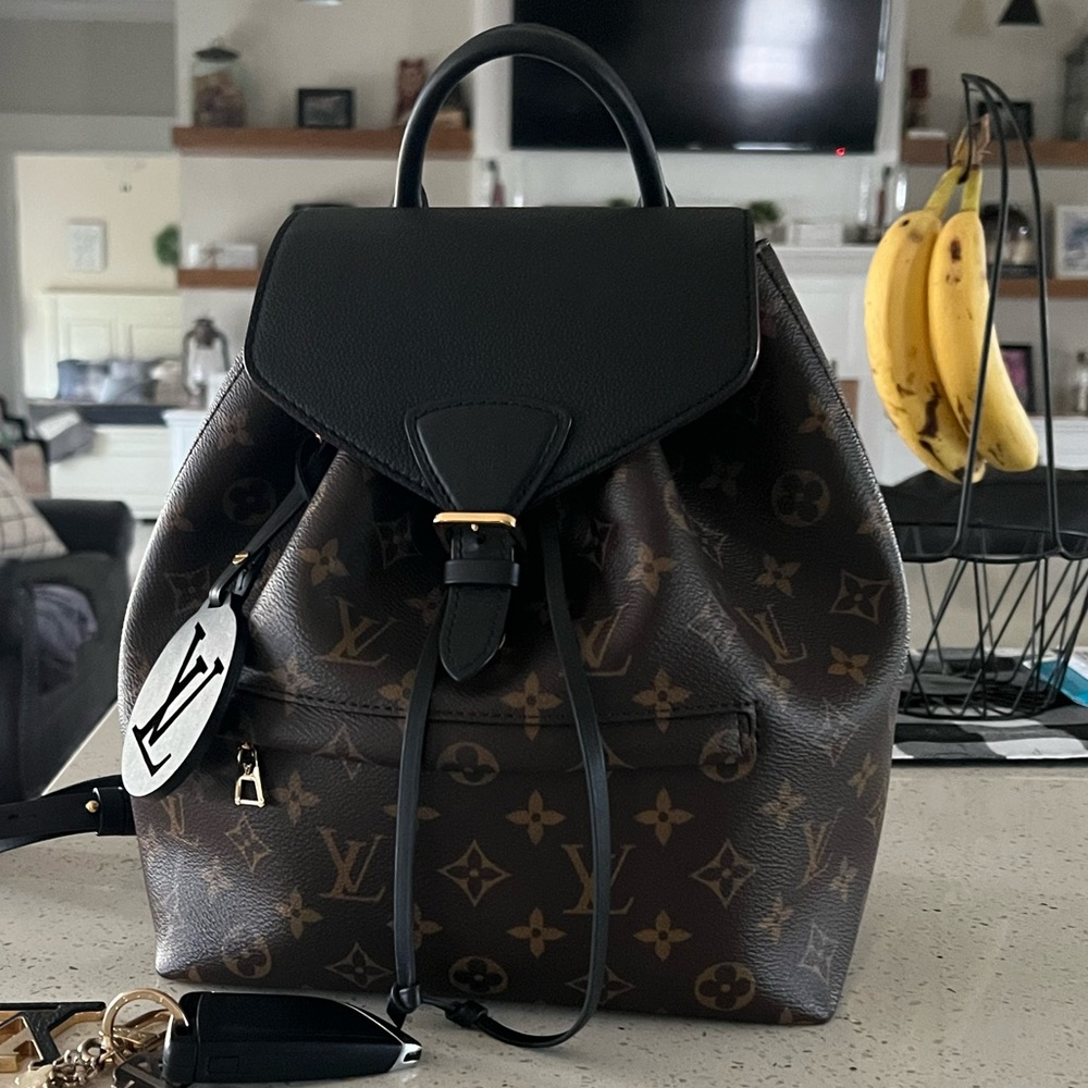 Authentic LV Montsouris PM, Brown/Black/inside is a burgundy red